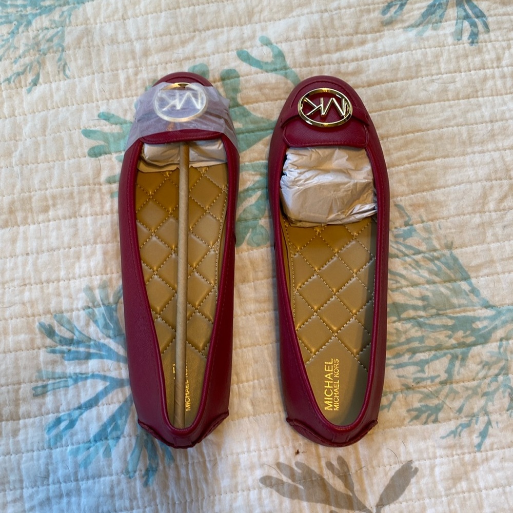 Brand new Michael Kors berry colored Fulton Mocs